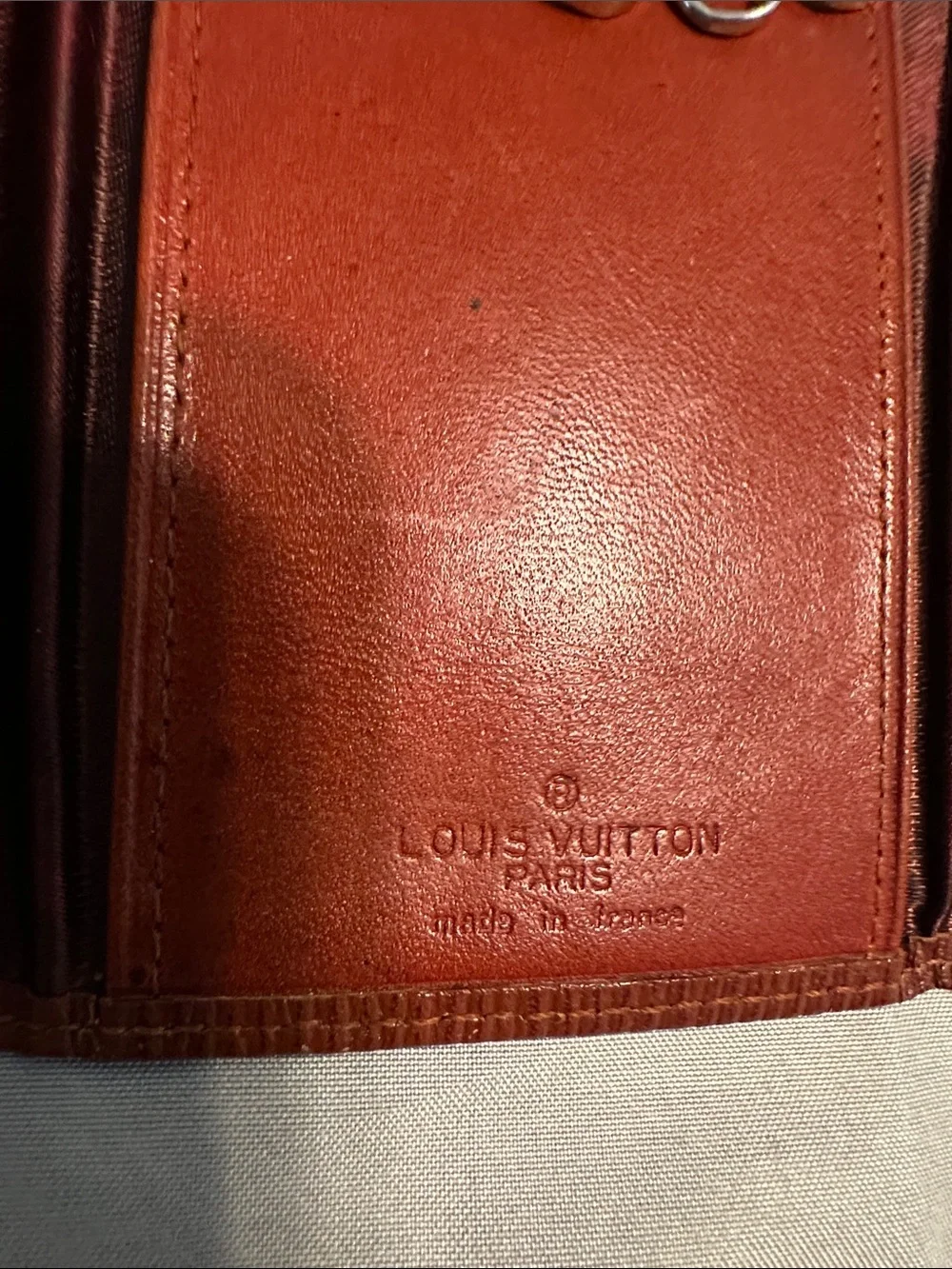 Louis Vuitton Embossed Epi Leather Card Holder in Brown
